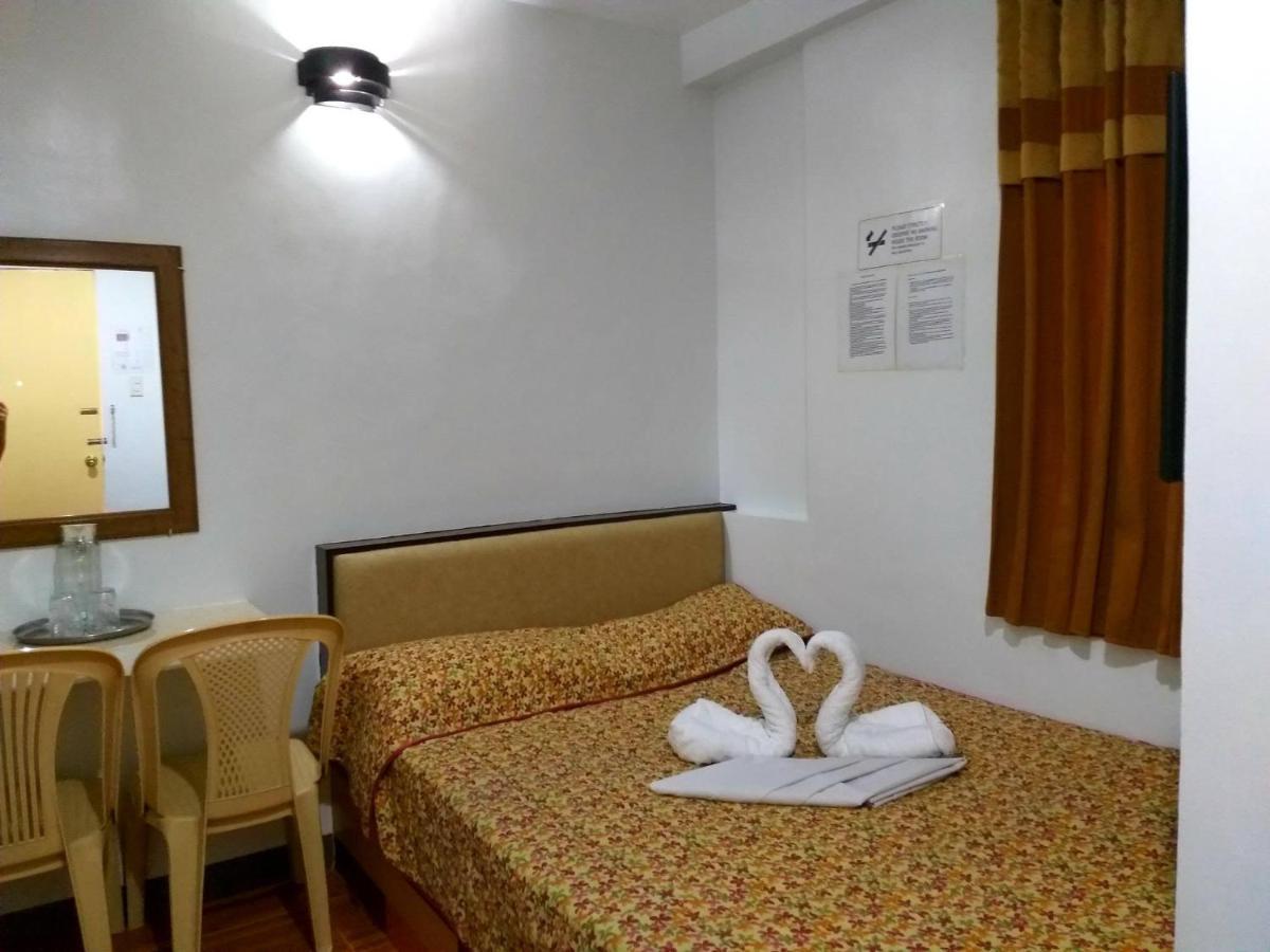 קואזון סיטי Sola Eleganza Apartelle מראה חיצוני תמונה